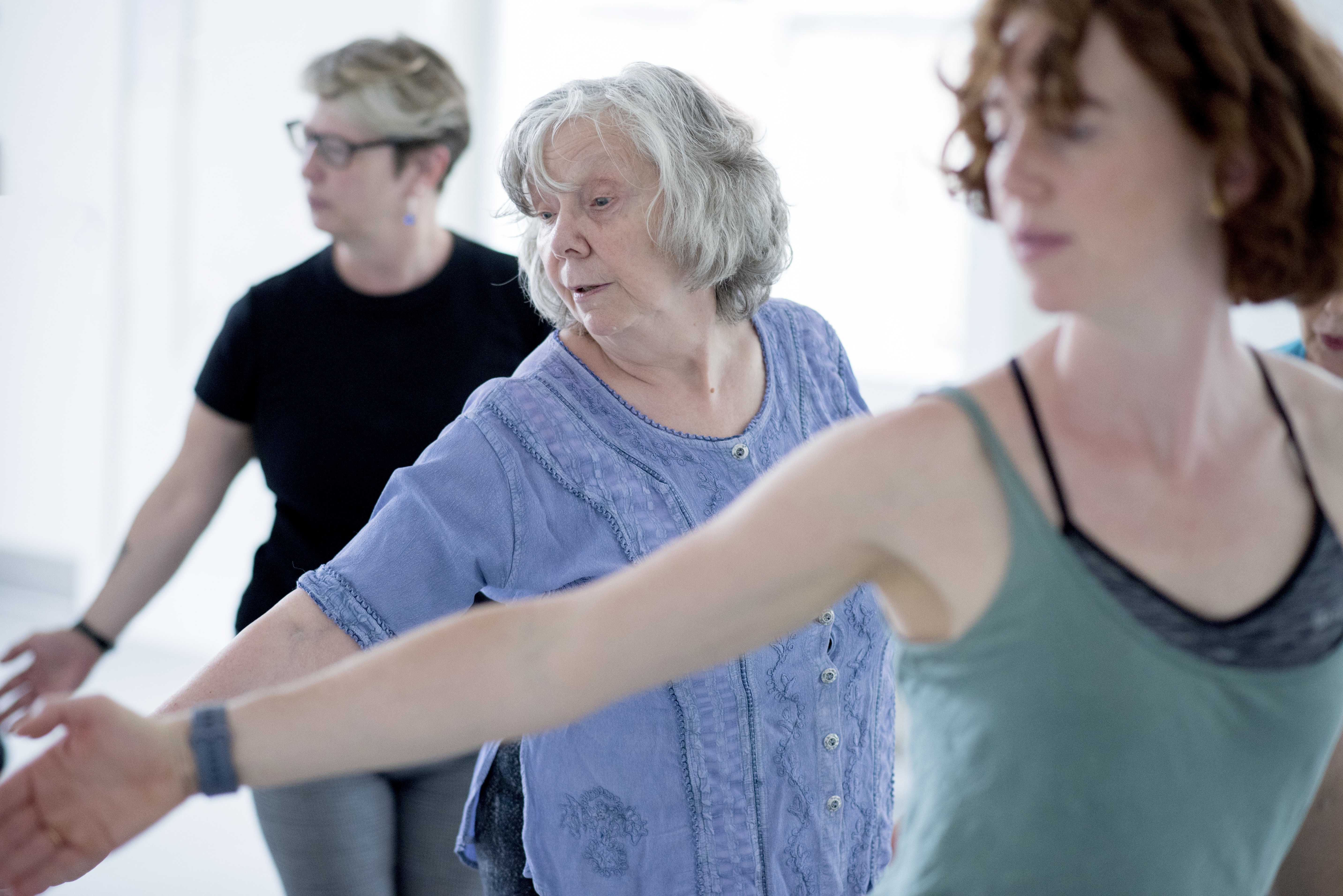 Three people dancing