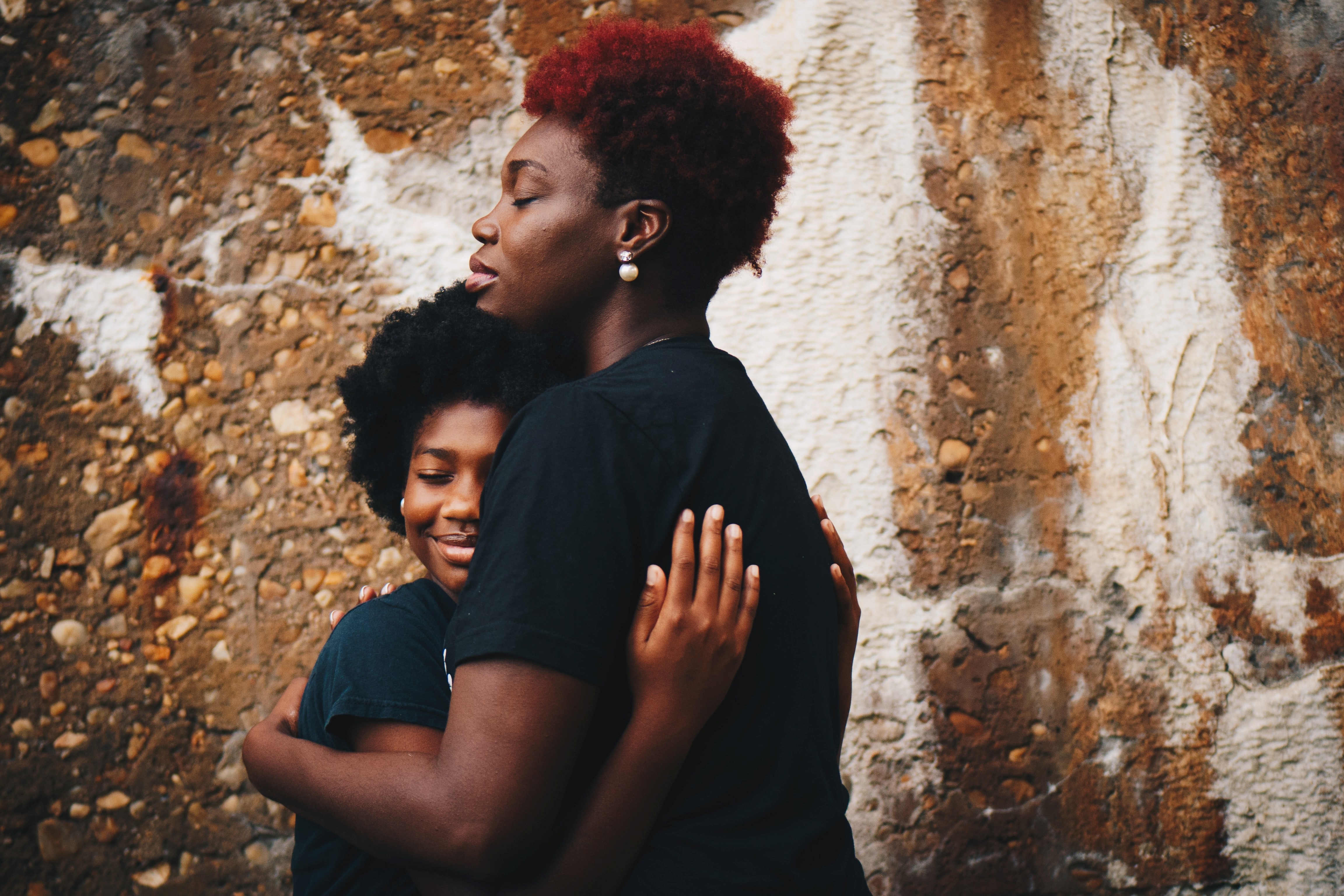 Two people hugging