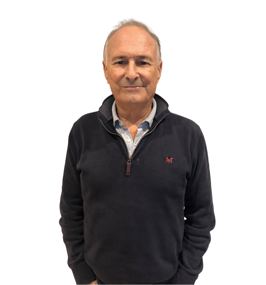 Trustee David Wilkinson wears a black zip-up fleece and smiles at the camera