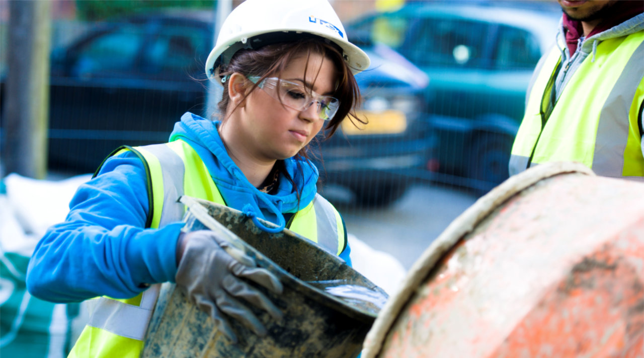 A young person working in construction