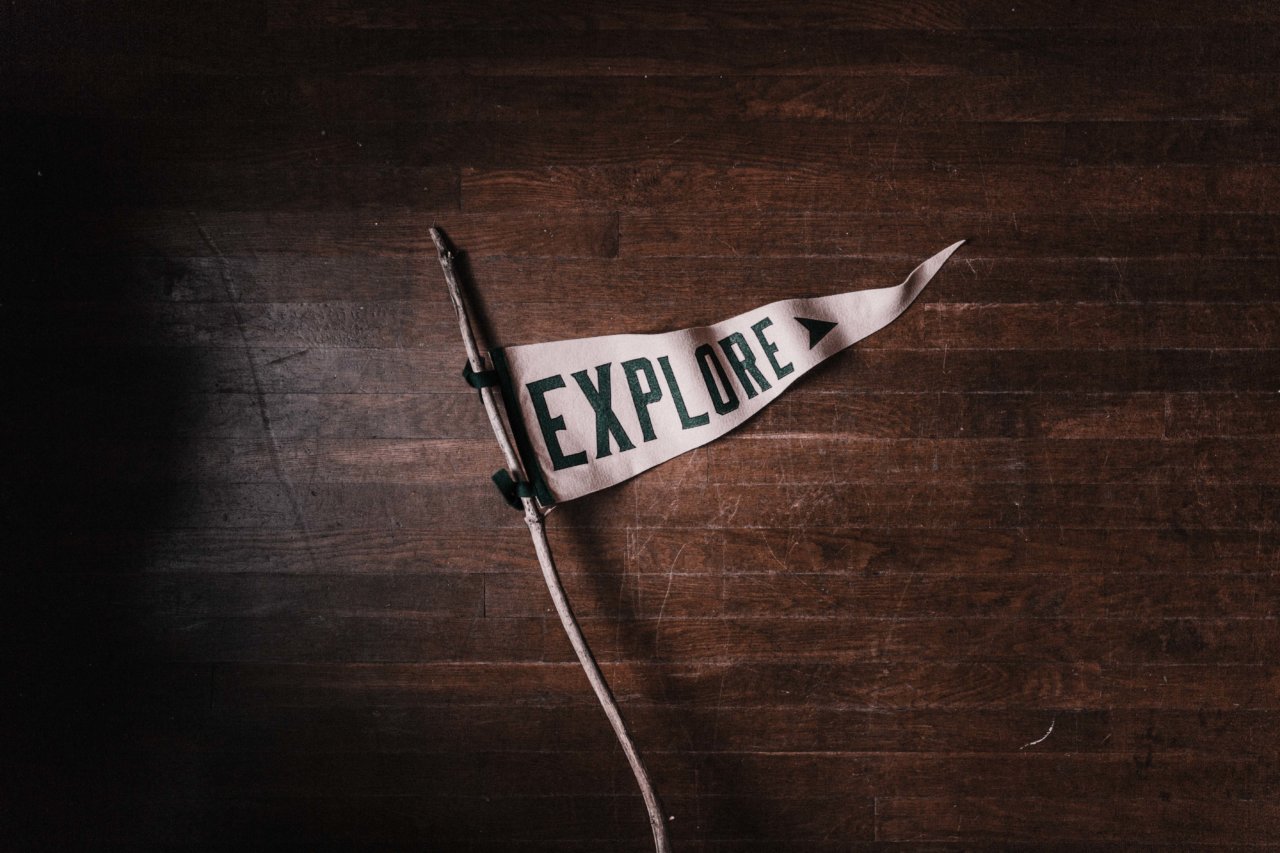 A flag with the word explore on it