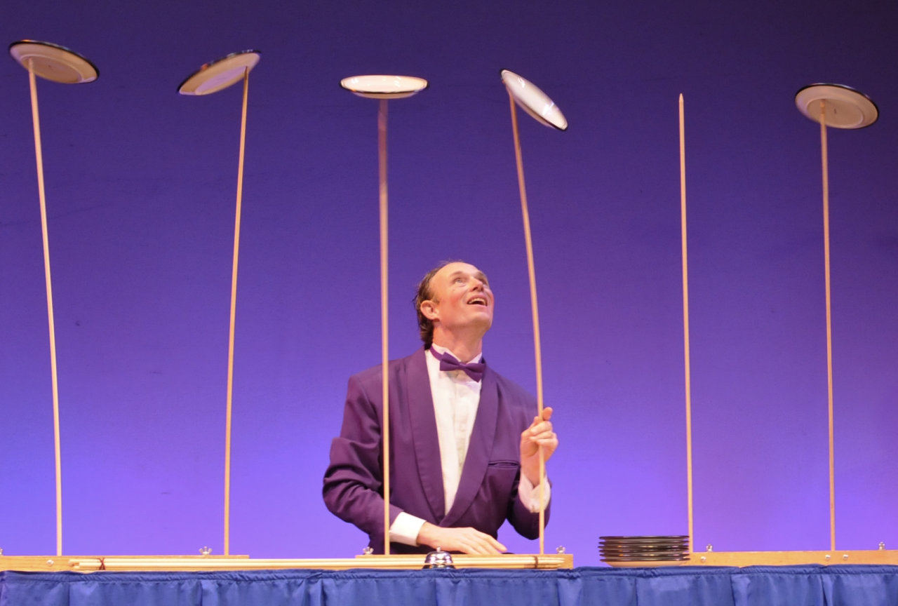 Man spinning plates