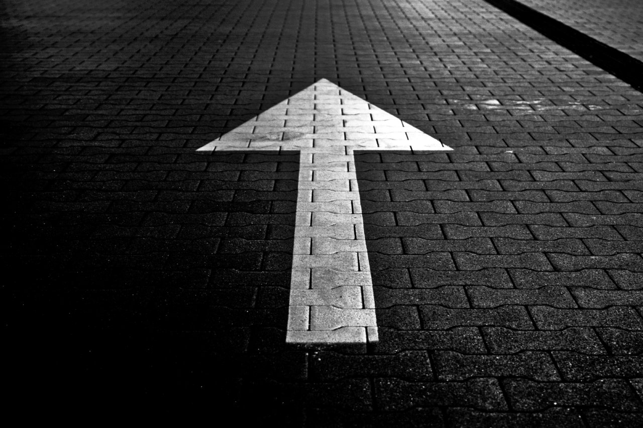 An arrow painted on a road