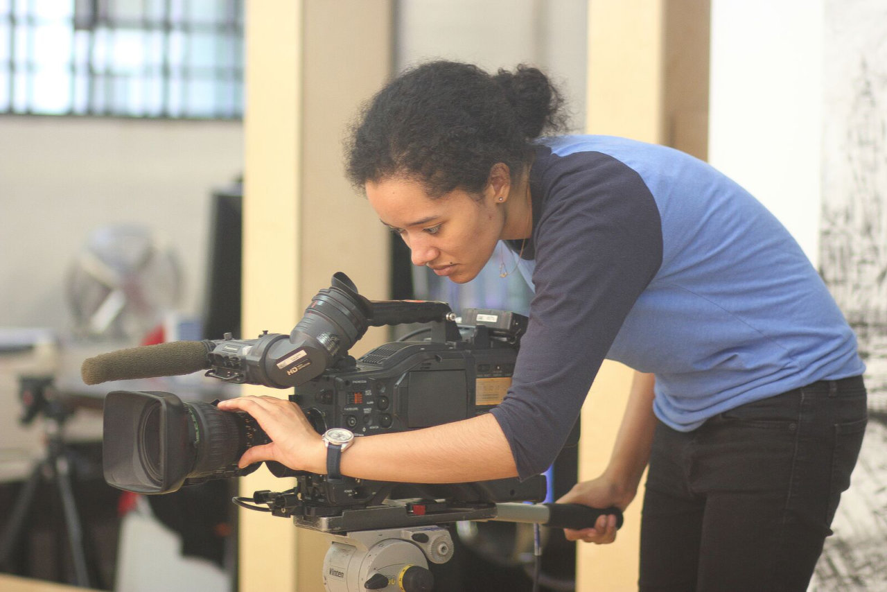 A girl holding a camera