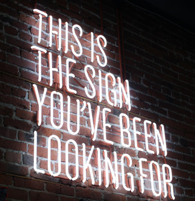 'This is the sign you've been looking for' neon sign