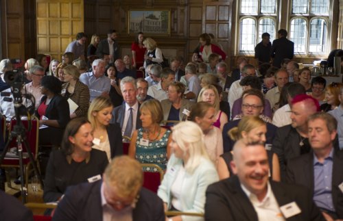 Delegates watching a conference