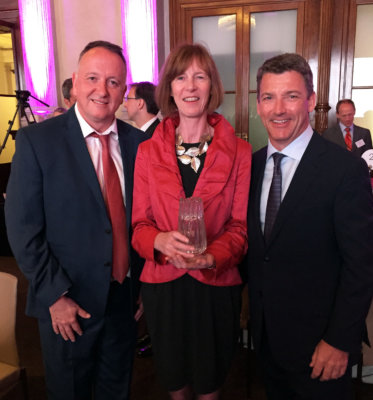Photo of David King, Gillian Murray and Graham Clempson receiving the Beacon Award